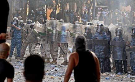 Scene of protesters and riot police in Beirut, Lebanon